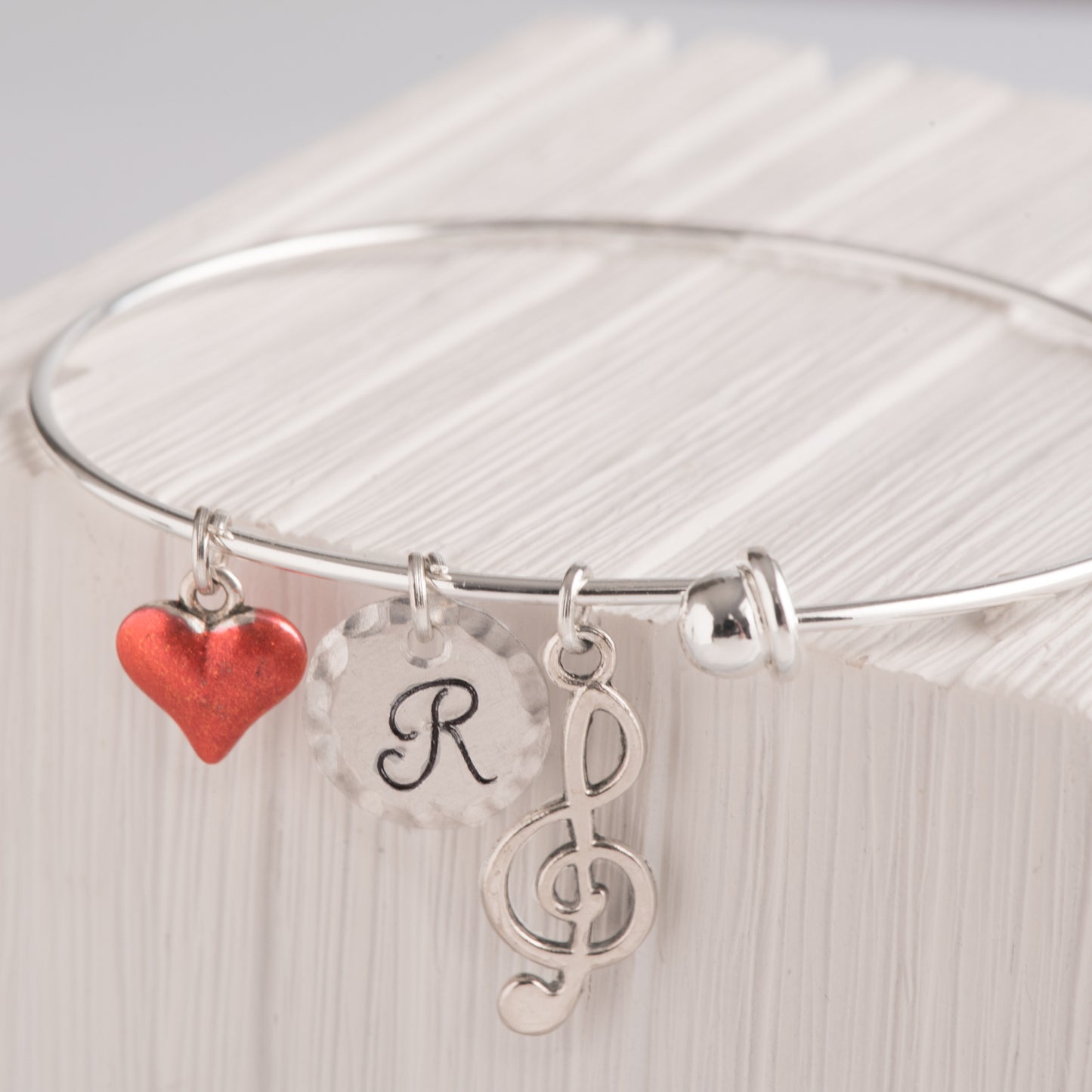 Bracciale con nota musicale e ciondoli personalizzabili
